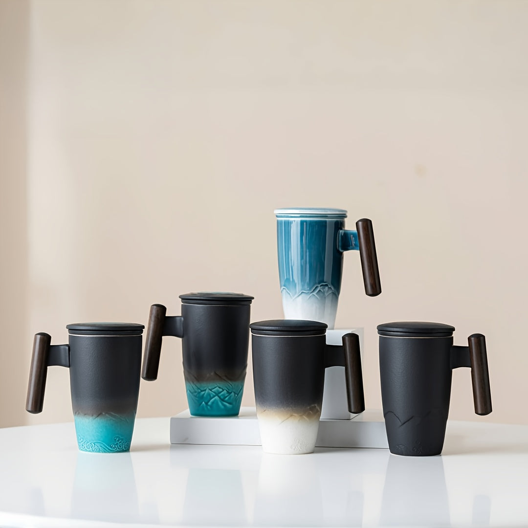 Handmade ceramic tea cup with strainer lid and wooden handle
