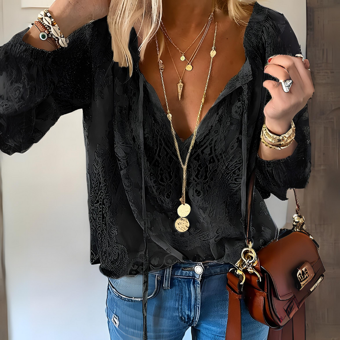 Women's boho lace V-neck blouse with a relaxed flowing fit