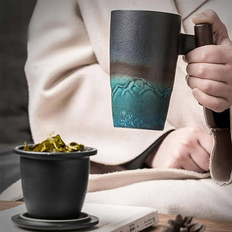 Handmade ceramic tea cup with strainer lid and wooden handle