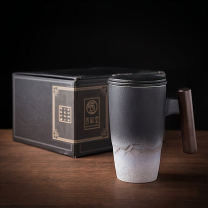 Handmade ceramic tea cup with strainer lid and wooden handle