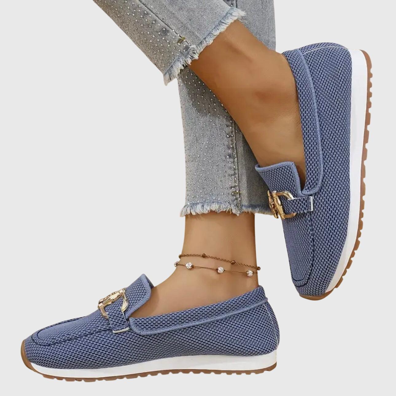 Women's slip-on loafers with gold-tone trim and cushioned insole