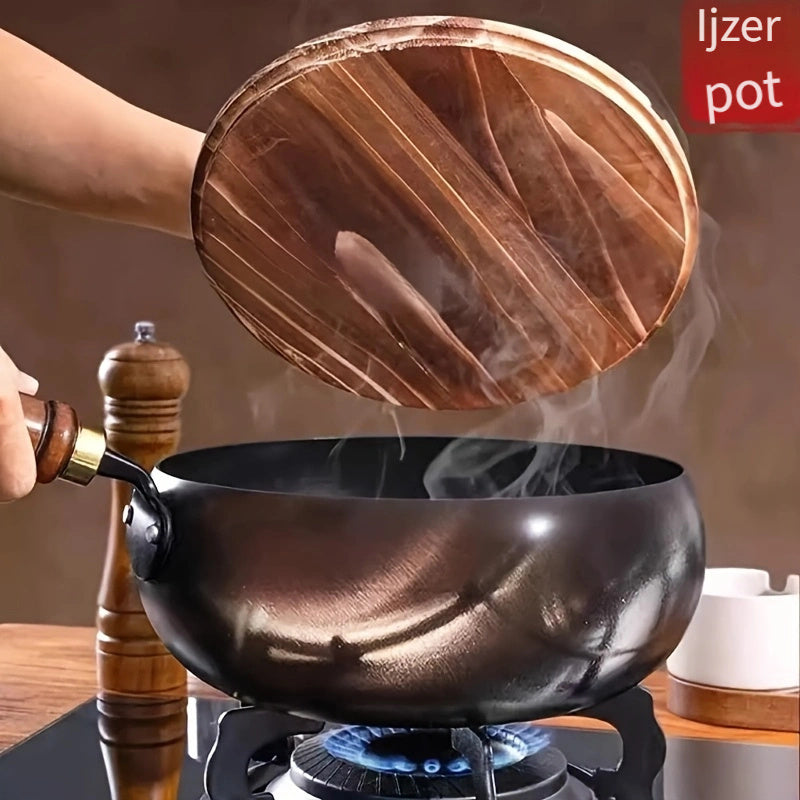 Cast iron pan with wooden handle and lid