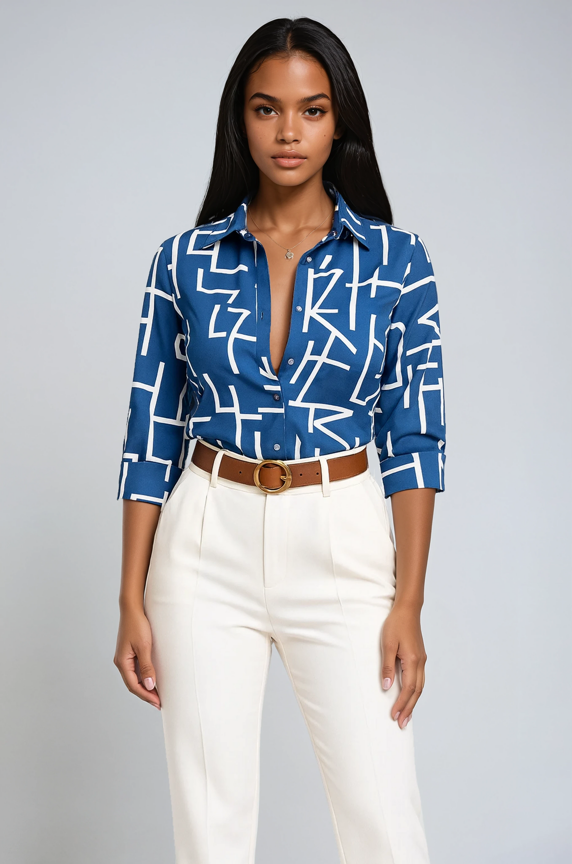 Women's printed button-up blouse with pointed collar and 3/4 sleeves