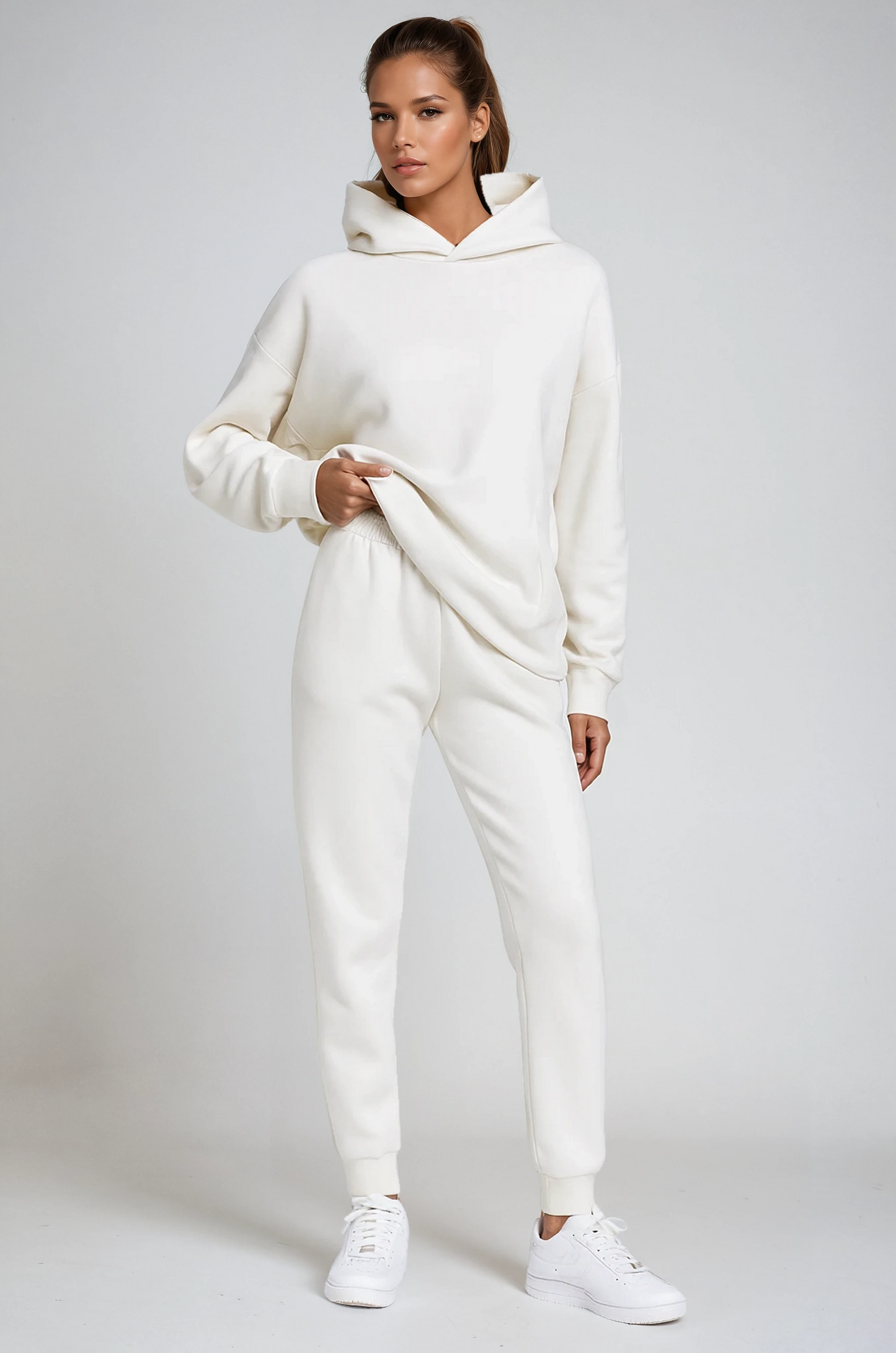 Women's hooded jogging set with sweatshirt and joggers in cotton blend
