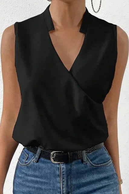 Women's sleeveless V-neck blouse with wrap front and floral print