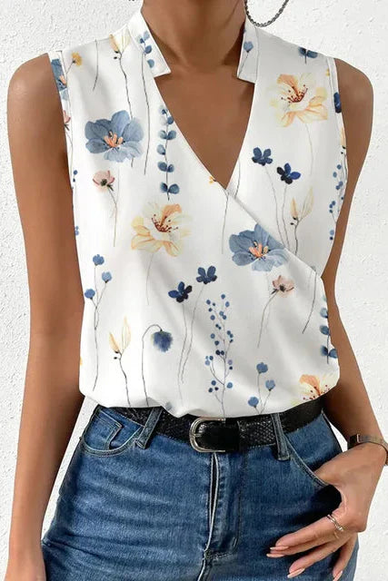 Women's sleeveless V-neck blouse with wrap front and floral print