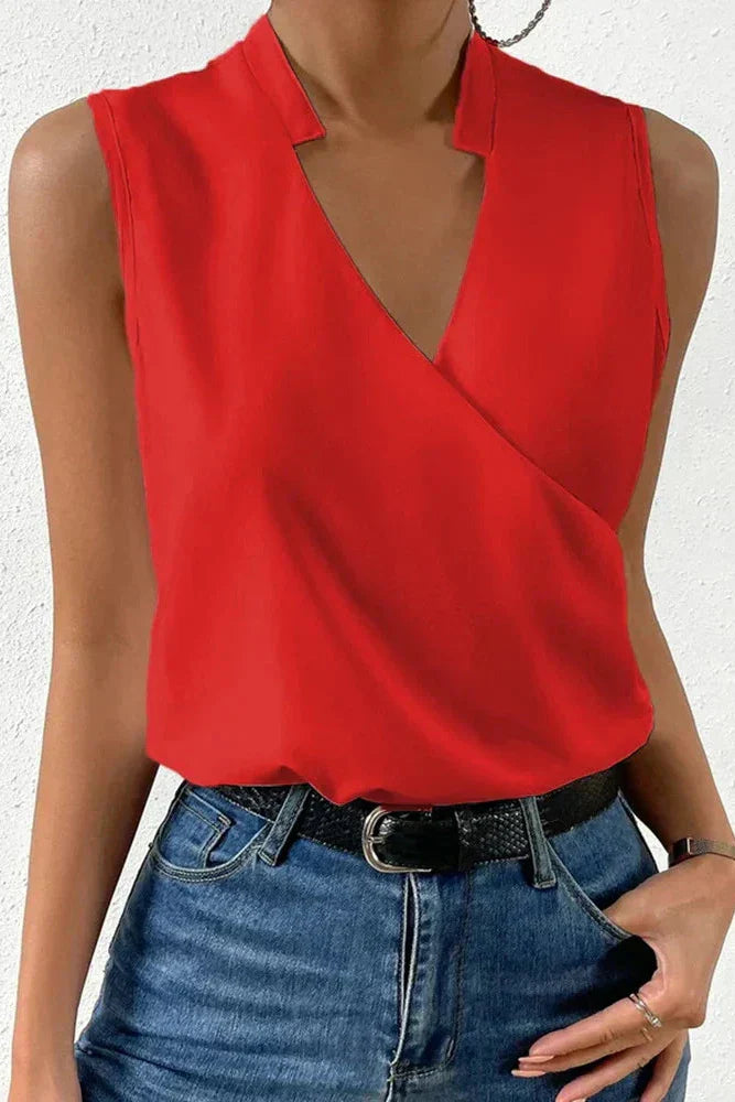 Women's sleeveless V-neck blouse with wrap front and floral print