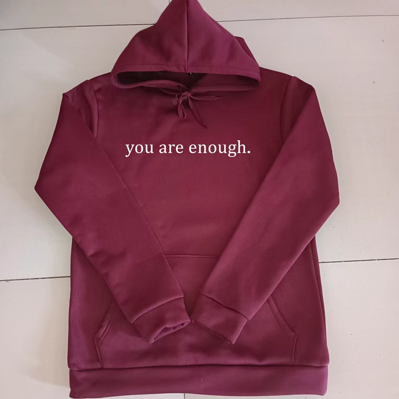 Unisex slogan hooded sweatshirt with a love-themed print