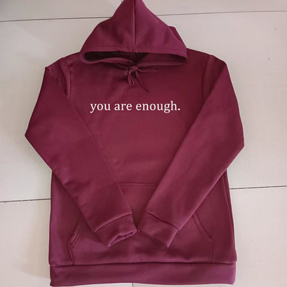 Unisex slogan hooded sweatshirt with a love-themed print