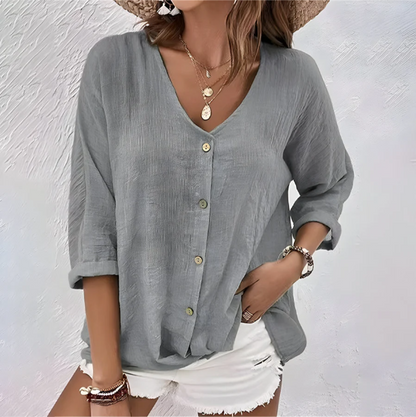 Women's relaxed V-neck button-up blouse with roll sleeves
