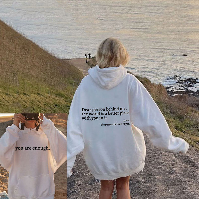 Unisex slogan hooded sweatshirt with a love-themed print