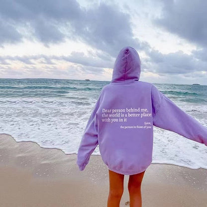 Unisex slogan hooded sweatshirt with a love-themed print