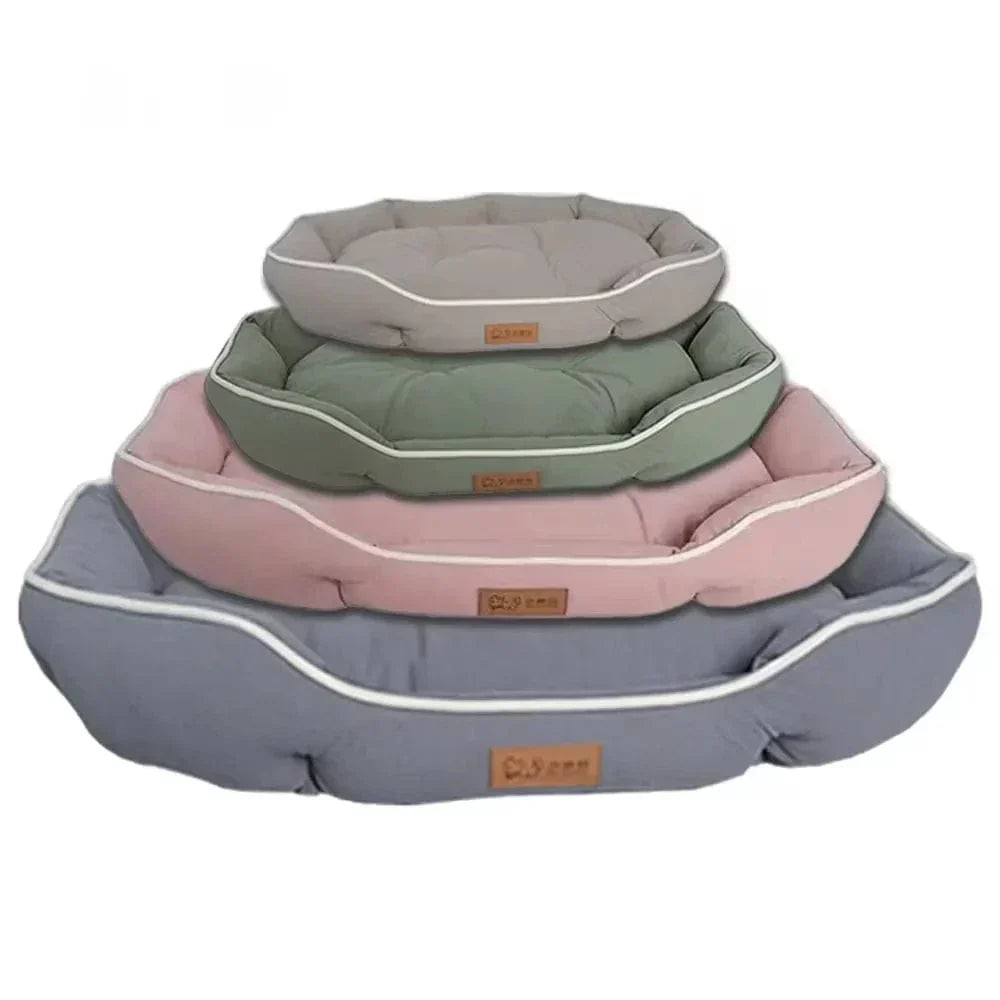 Soft oval cushioned dog bed with bolster edge