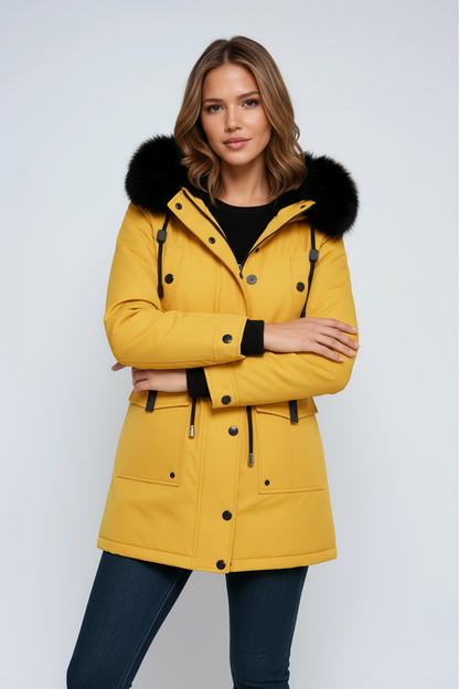 Women's parka coat with a faux fur hood and cinched waist for winter