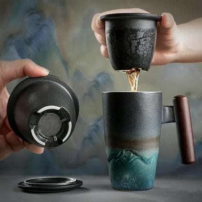 Handmade ceramic tea cup with strainer lid and wooden handle