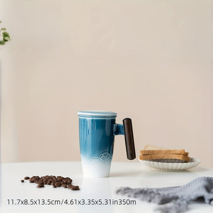 Handmade ceramic tea cup with strainer lid and wooden handle