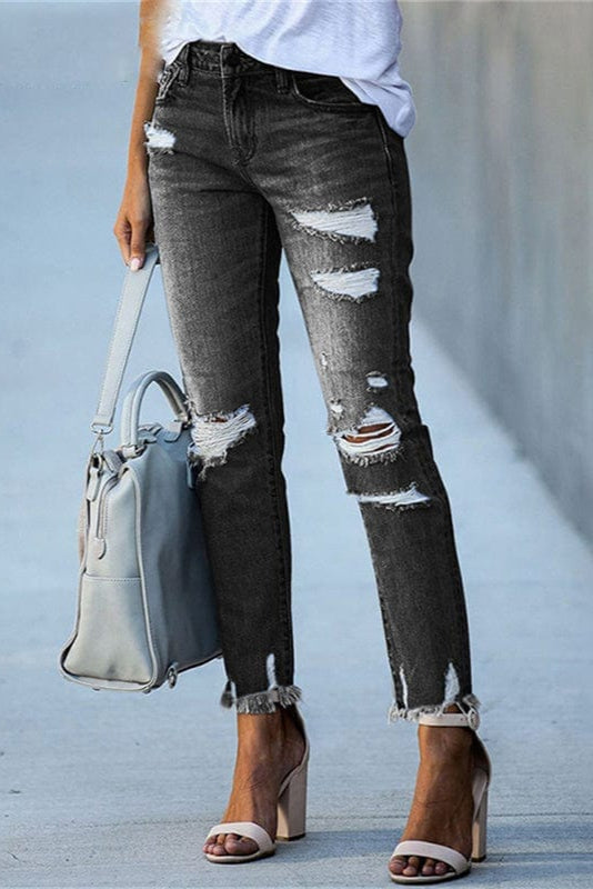 Women's distressed straight-leg jeans with a raw hem in denim