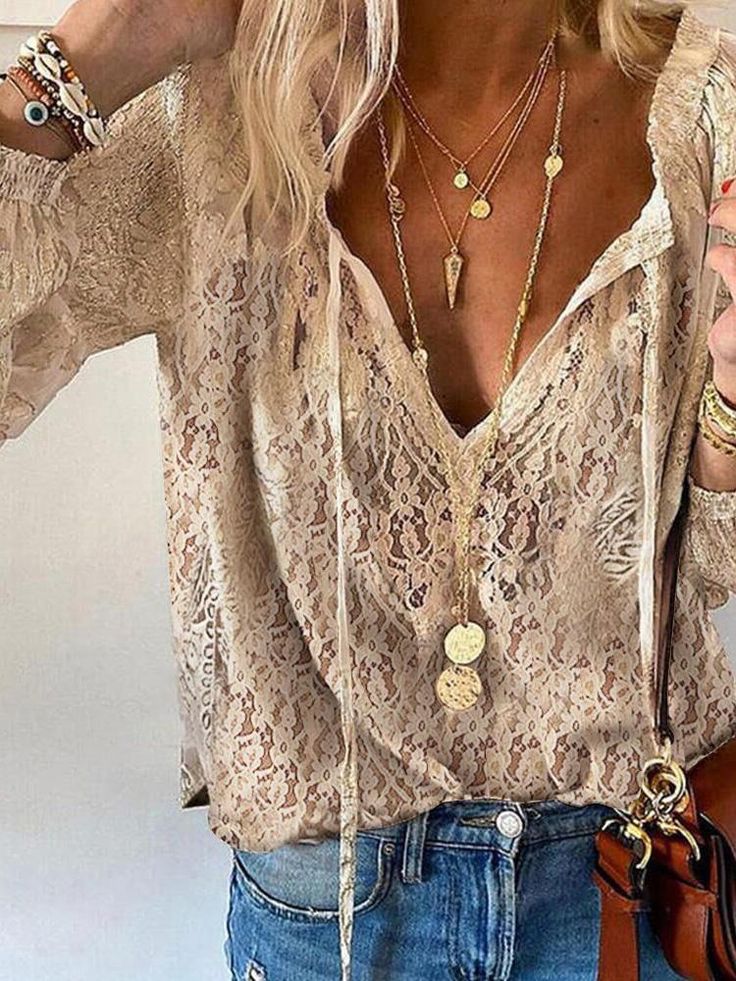 Women's boho lace V-neck blouse with a relaxed flowing fit