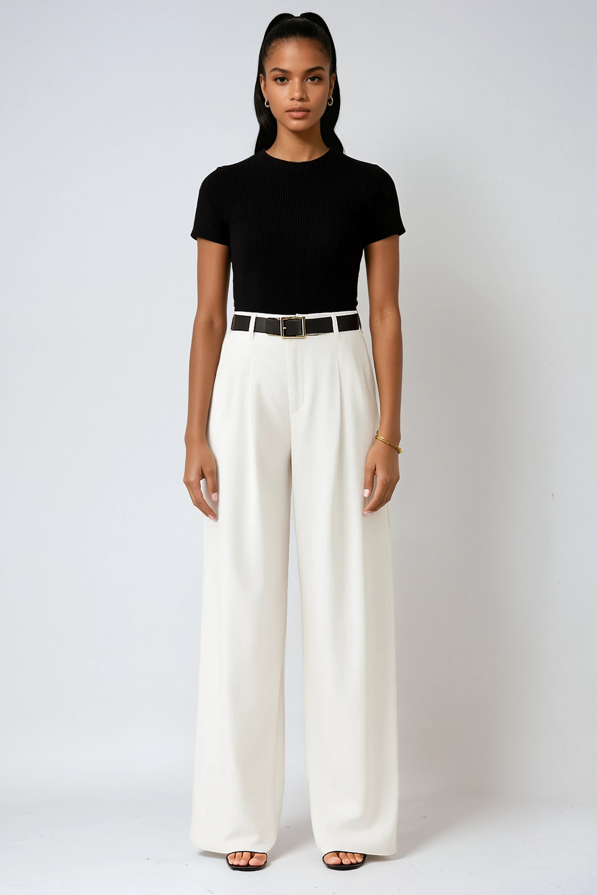 Women's high-waist wide-leg pleated trousers in a tailored fit