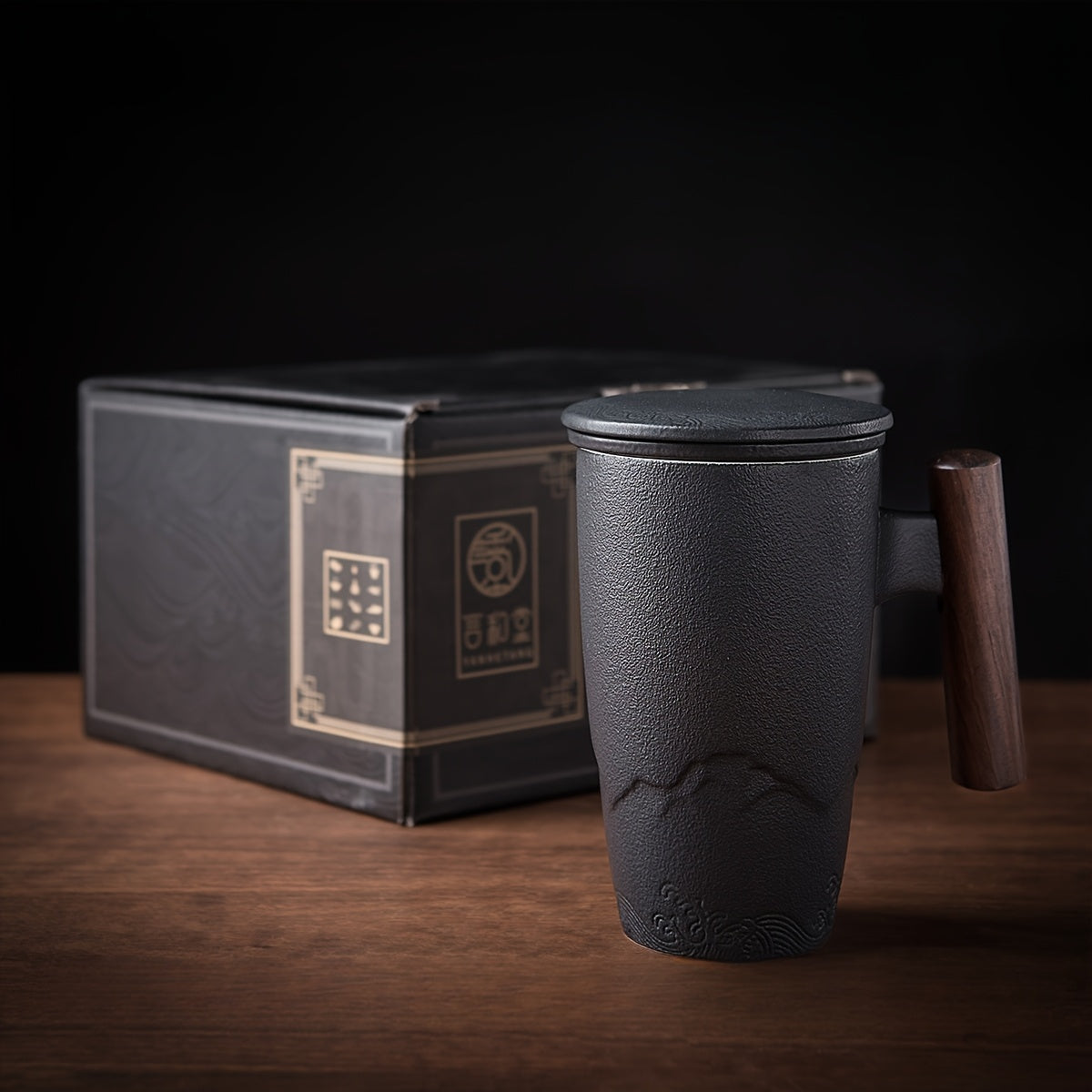 Handmade ceramic tea cup with strainer lid and wooden handle