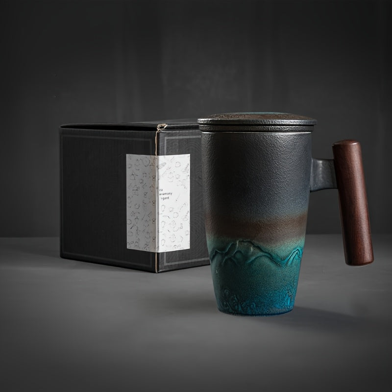 Handmade ceramic tea cup with strainer lid and wooden handle