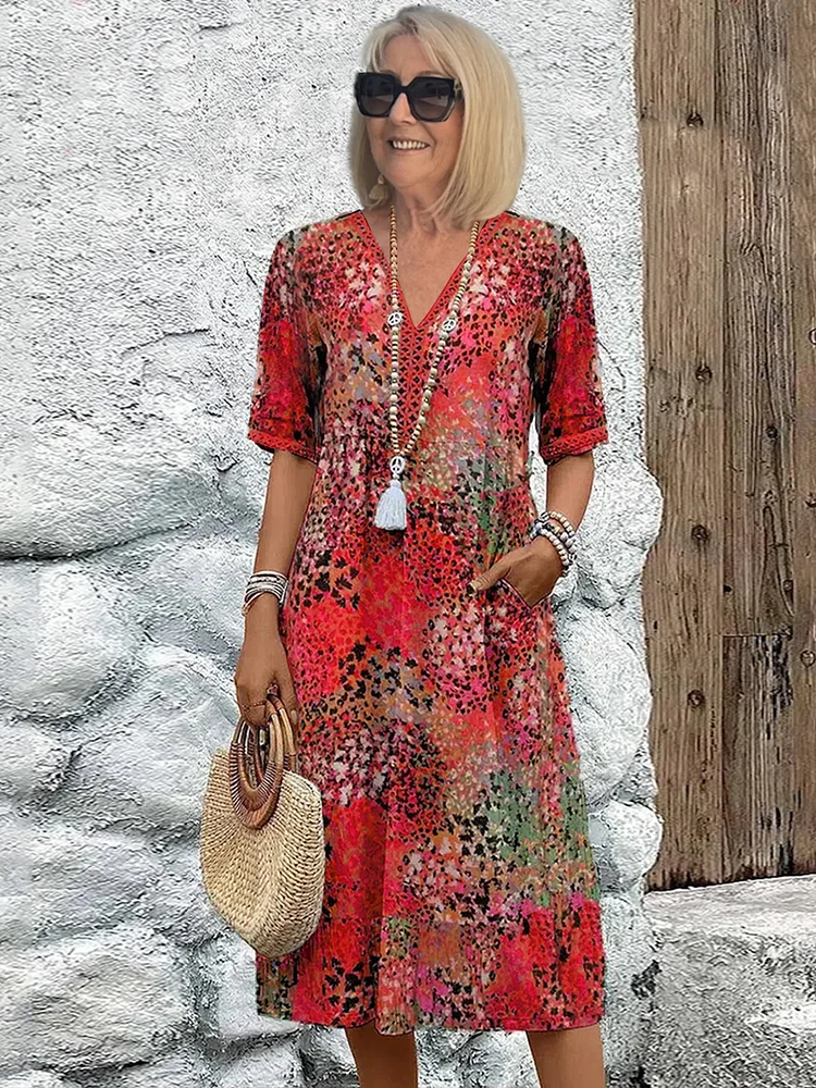 Women's colourful midi dress with pockets - front