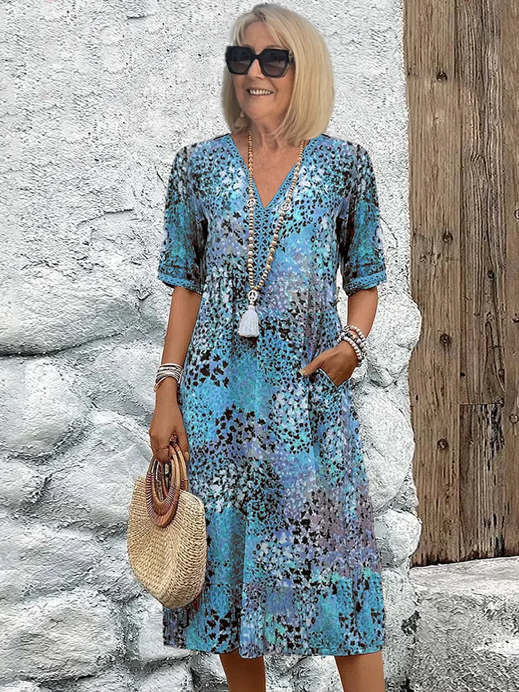 Women's colourful midi dress with pockets - side