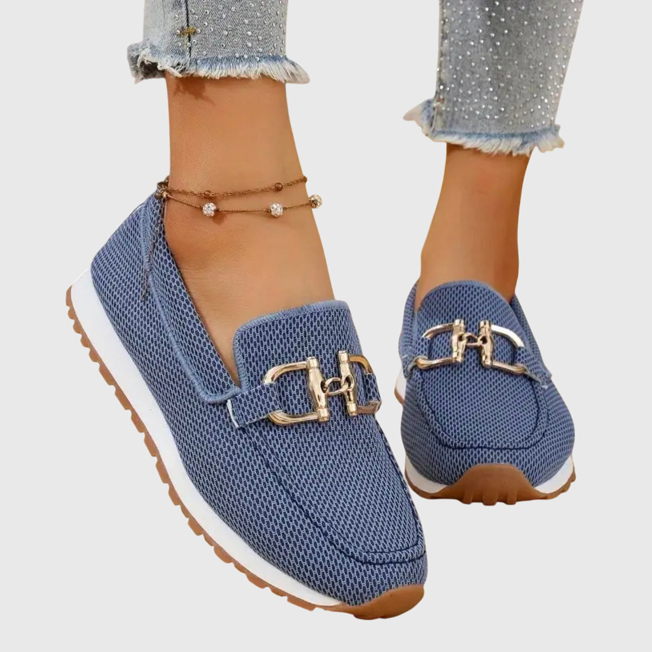 Women's slip-on loafers with gold-tone trim and cushioned insole