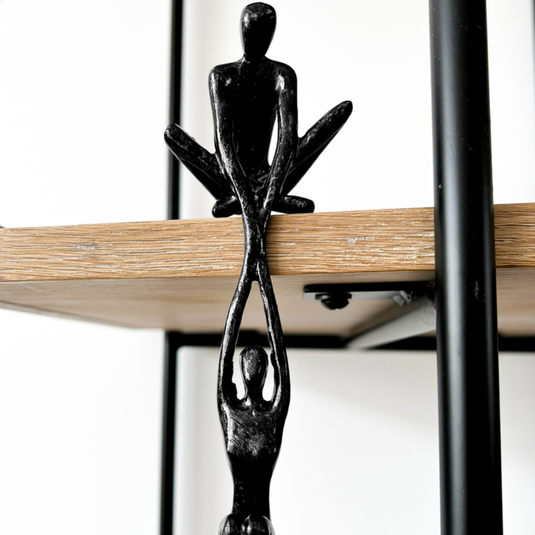 Modern two-figure sculpture statue in black