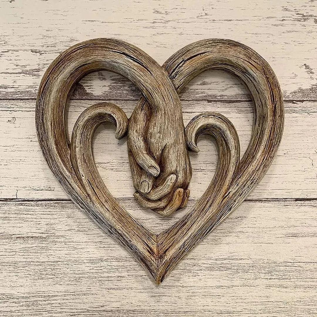Heart and hands sculptural wall decoration