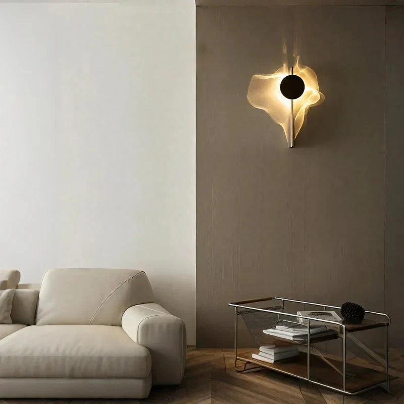 Rotatable sculptural LED effect wall light