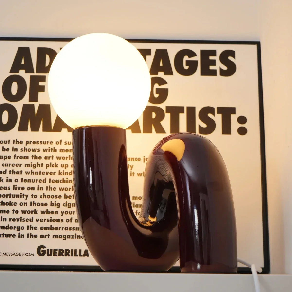Sculptural curved glass globe table lamp