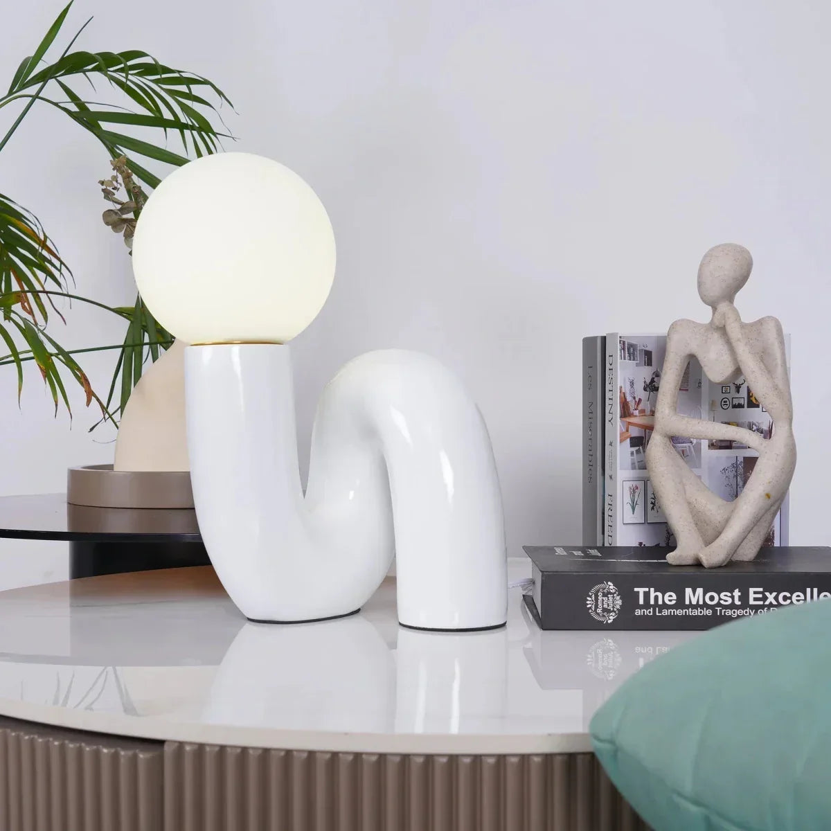 Sculptural curved glass globe table lamp