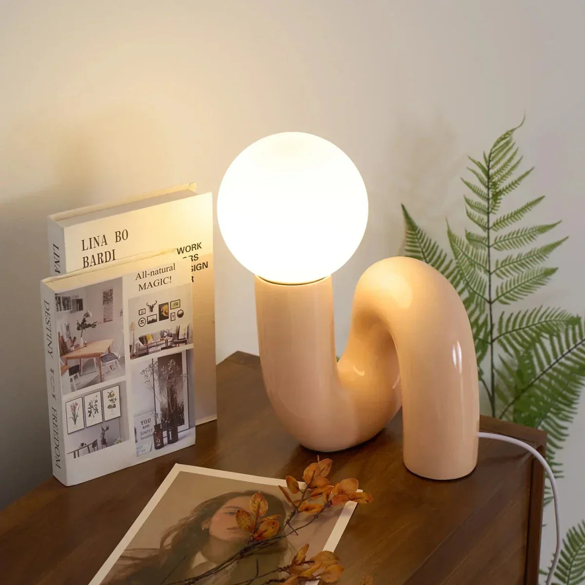 Sculptural curved glass globe table lamp