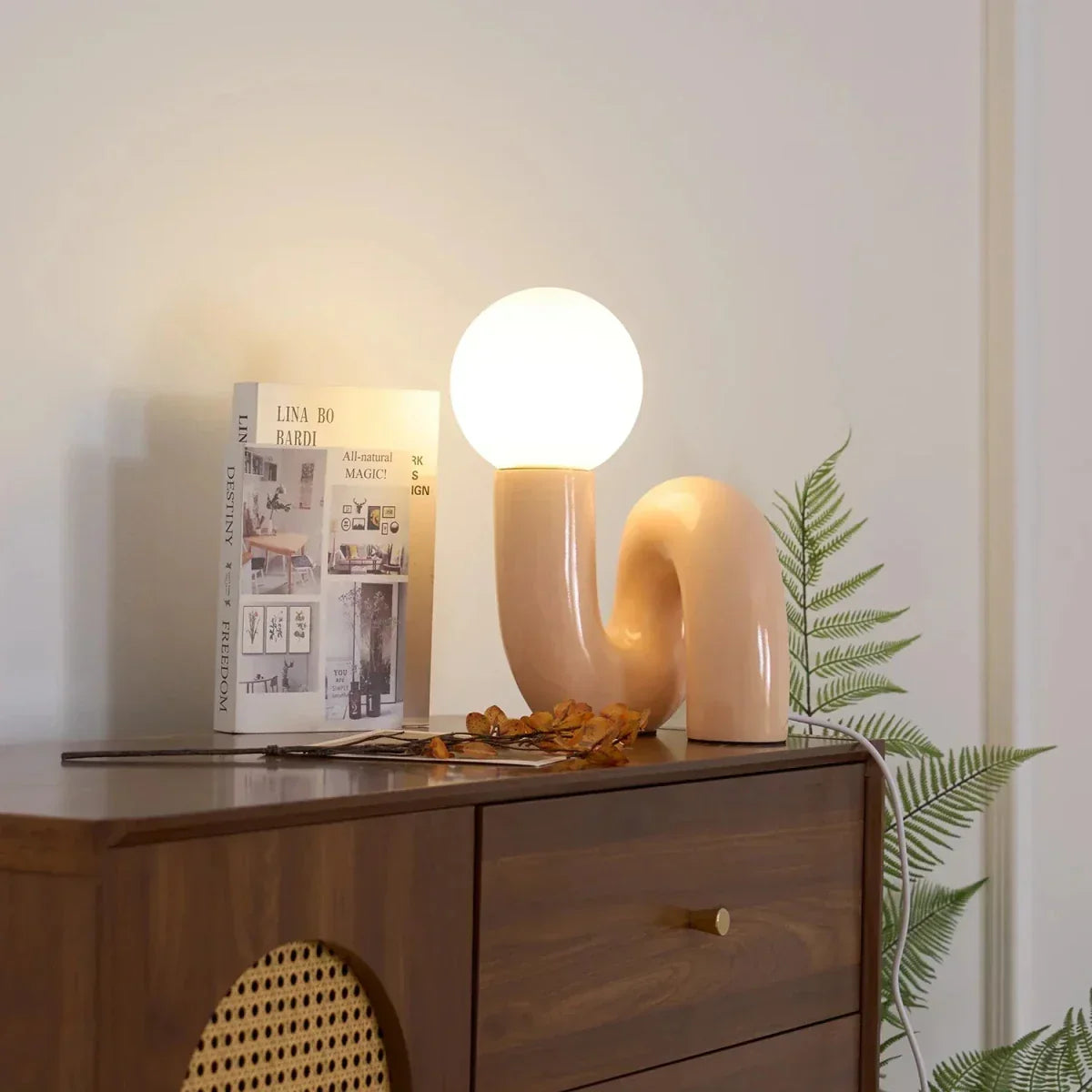 Sculptural curved glass globe table lamp