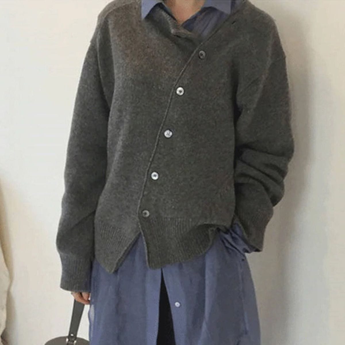 Women's wrap knit cardigan with asymmetric button detail