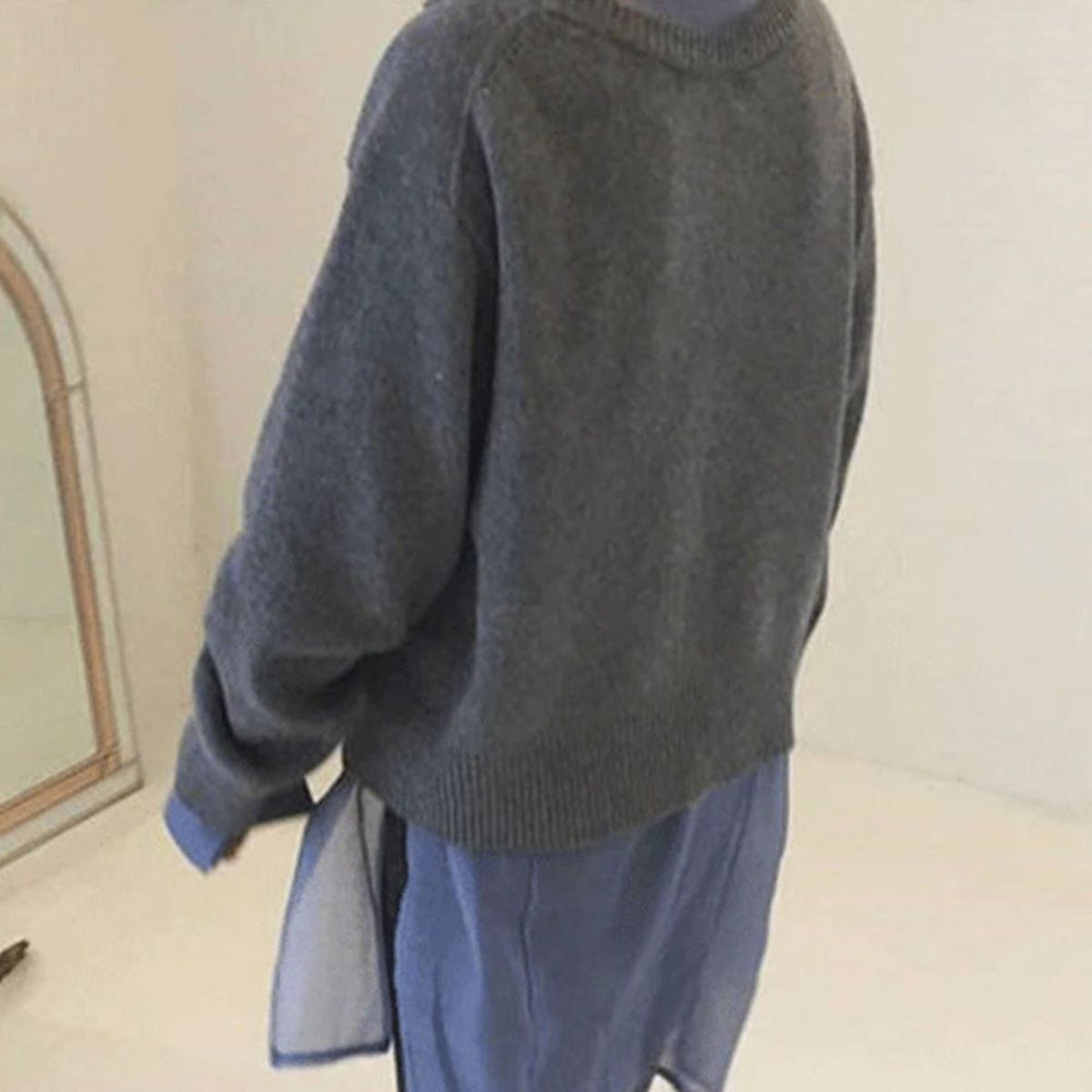 Women's wrap knit cardigan with asymmetric button detail