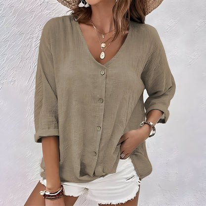 Women's relaxed V-neck button-up blouse with roll sleeves