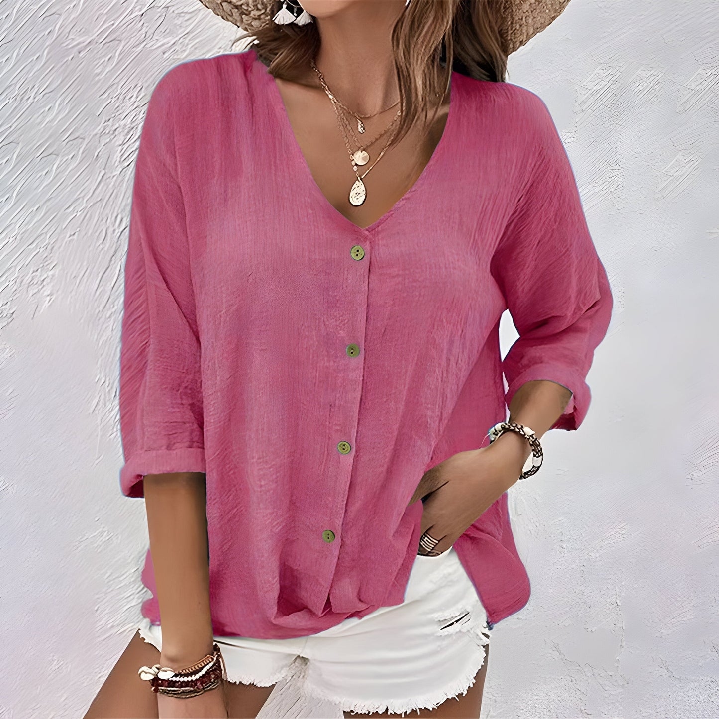 Women's relaxed V-neck button-up blouse with roll sleeves