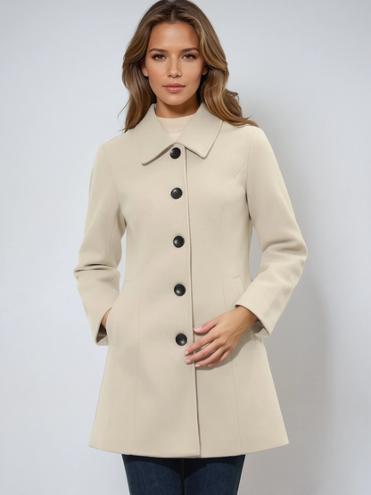 Women's single-breasted cotton trench coat in a longline winter silhouette