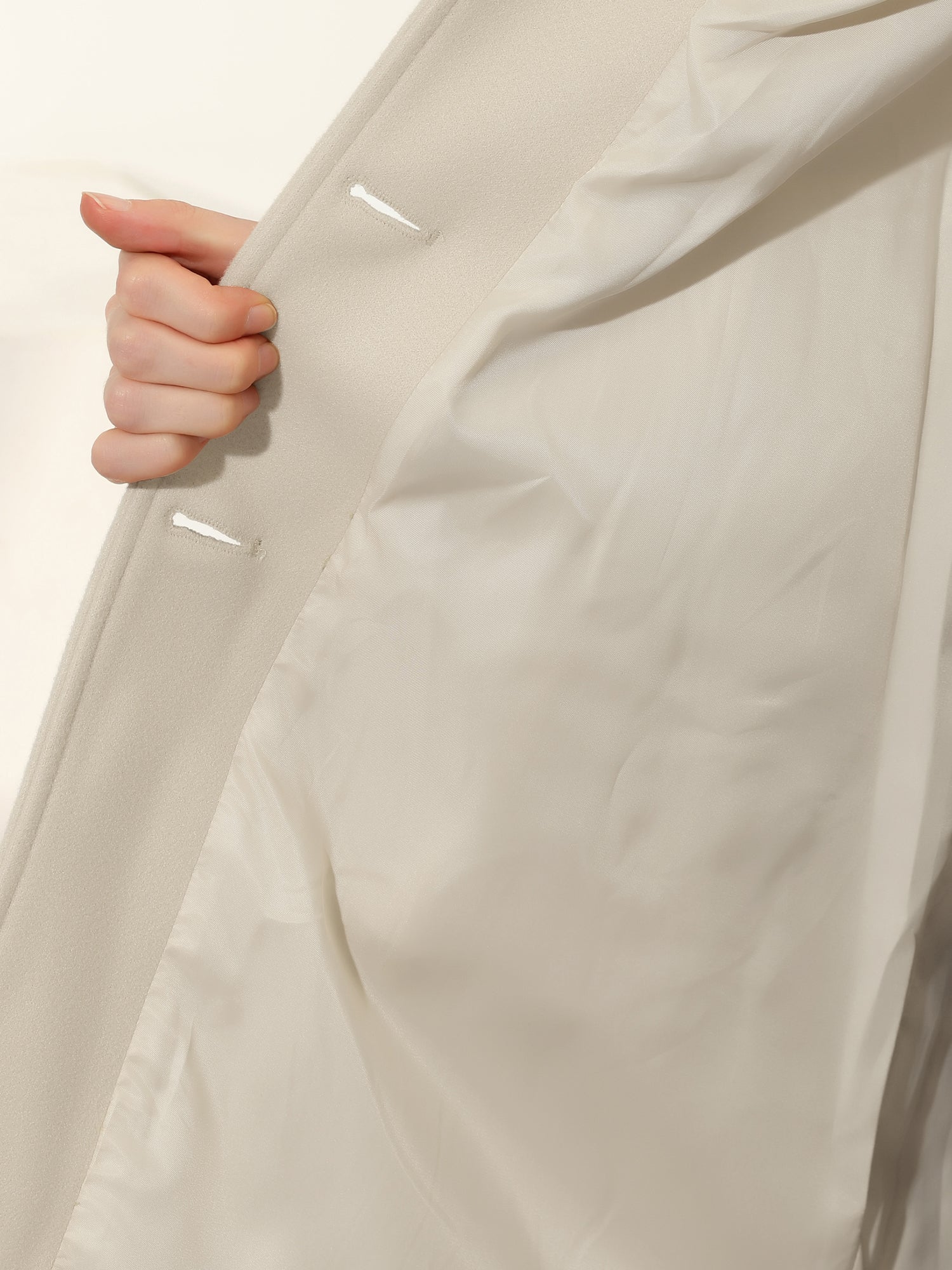Women's single-breasted cotton trench coat in a longline winter silhouette