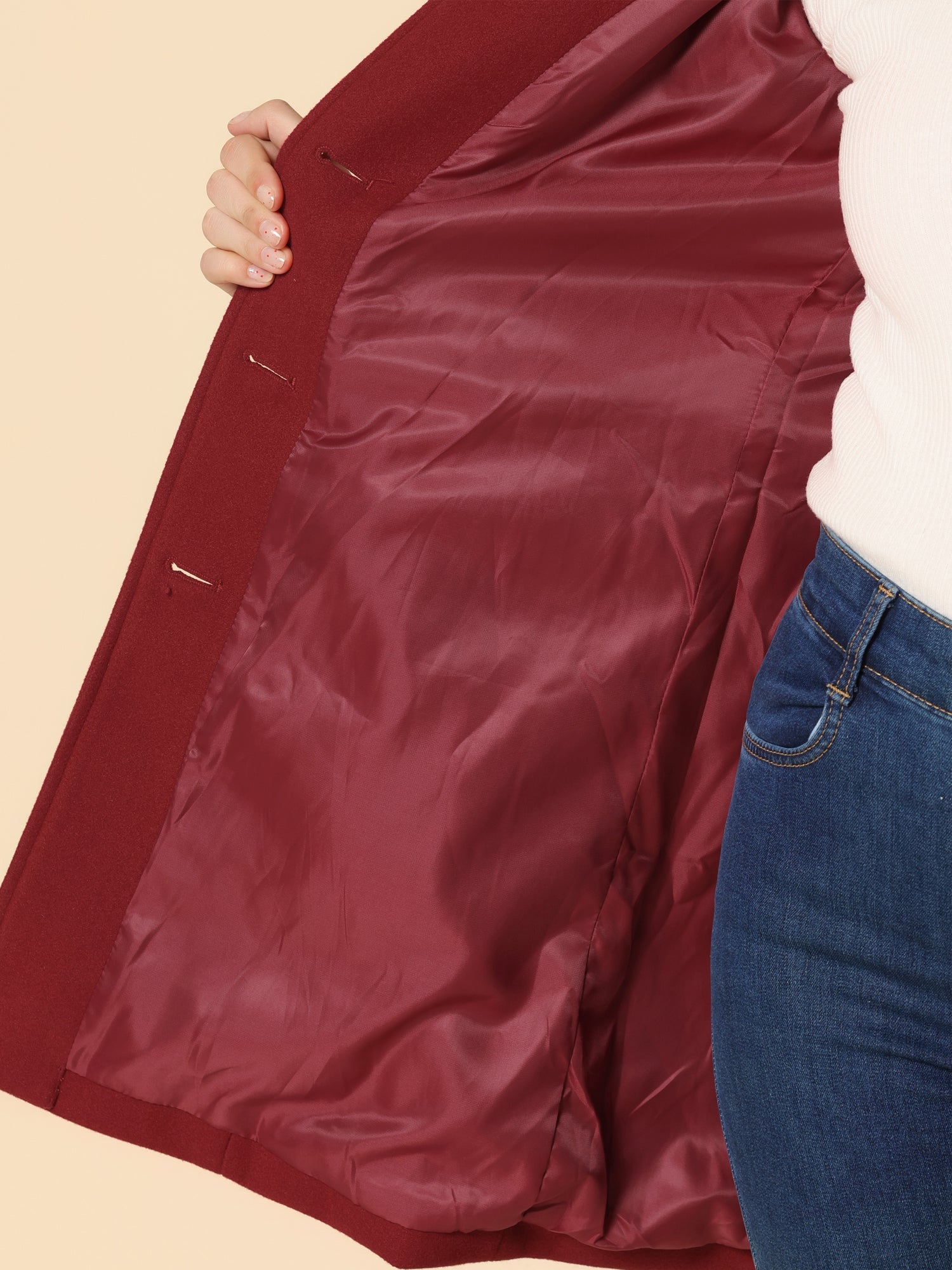 Women's single-breasted cotton trench coat in a longline winter silhouette