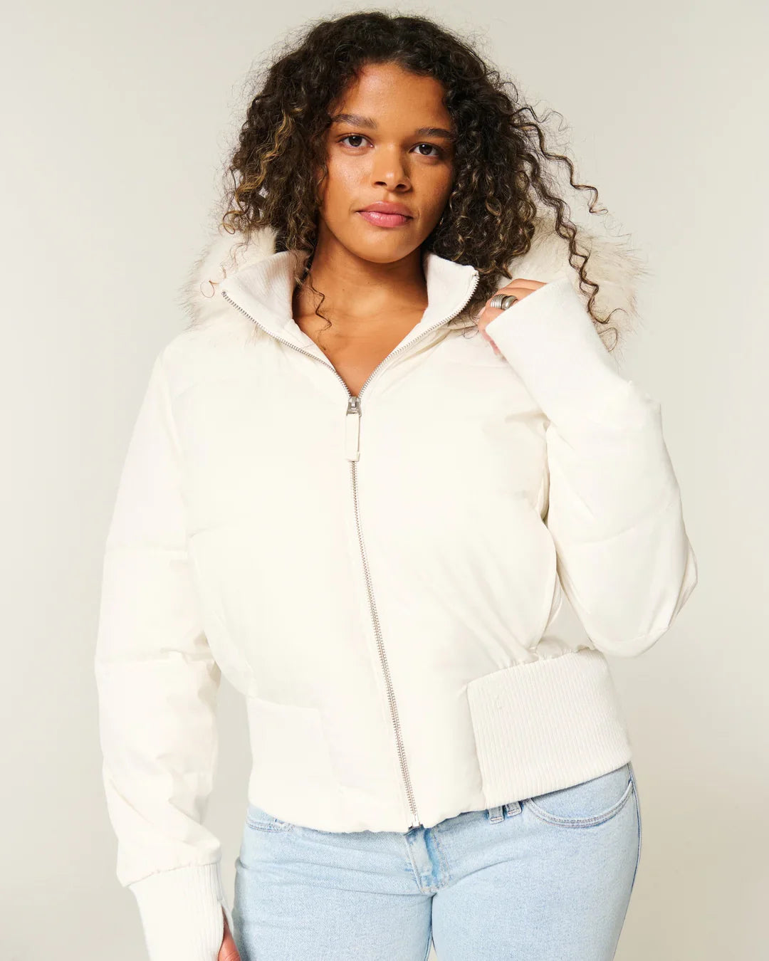 Women's white puffer jacket with faux fur hood