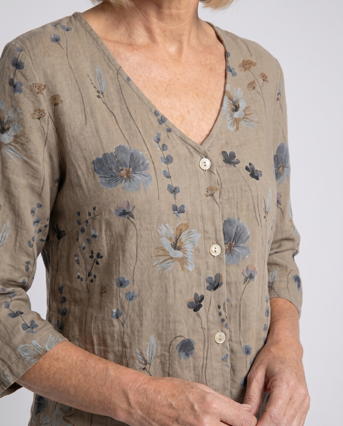 Women's floral blouse neckline detail